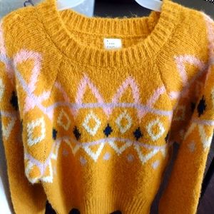 Crew neck style fuzzy knit sweater